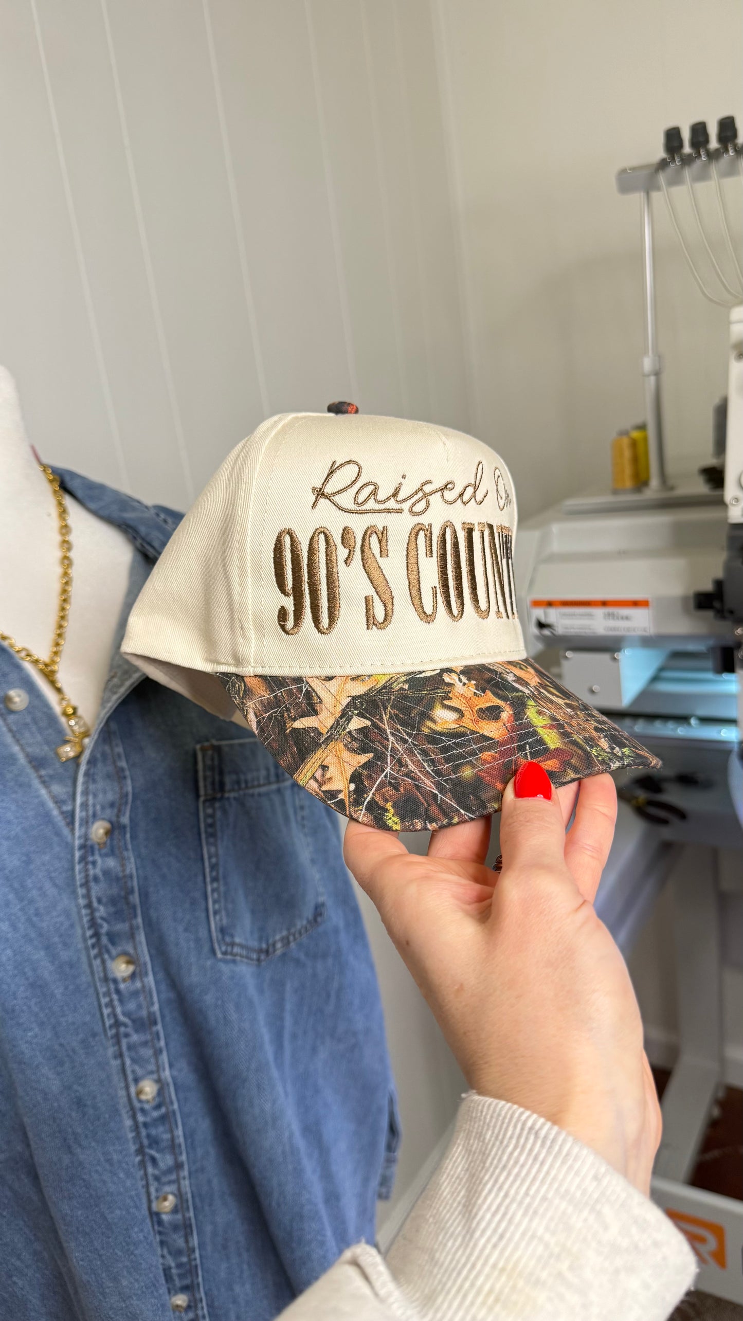 Raised On 90’s Country Camo Trucker Hat