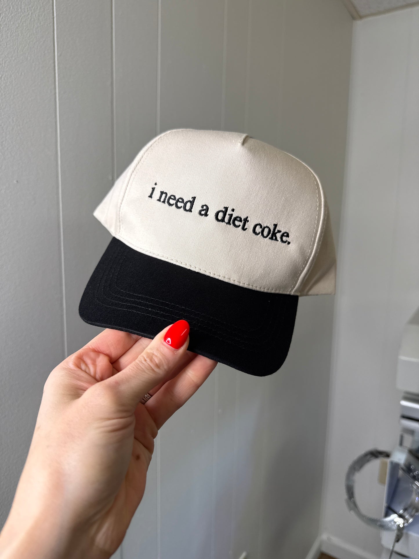I need a Diet Coke black trucker hat