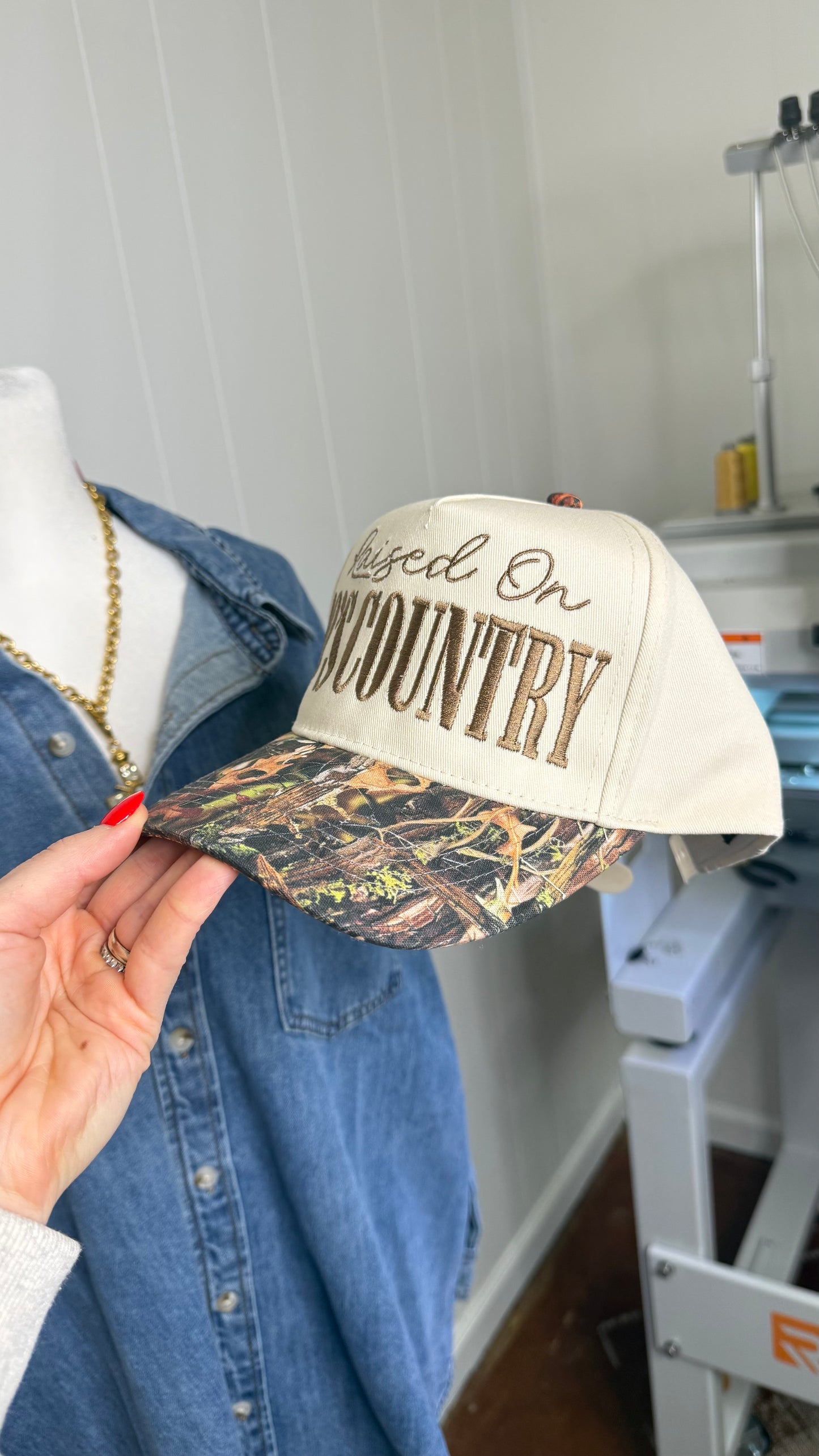Raised On 90’s Country Camo Trucker Hat