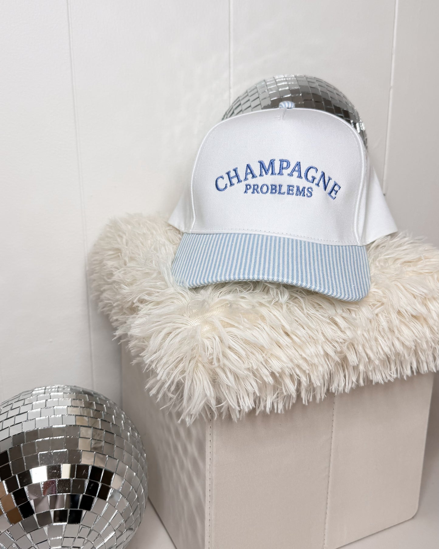 CHAMPAGNE PROBLEMS Striped Trucker Hat
