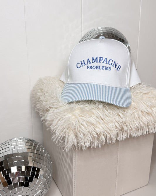 CHAMPAGNE PROBLEMS Striped Trucker Hat
