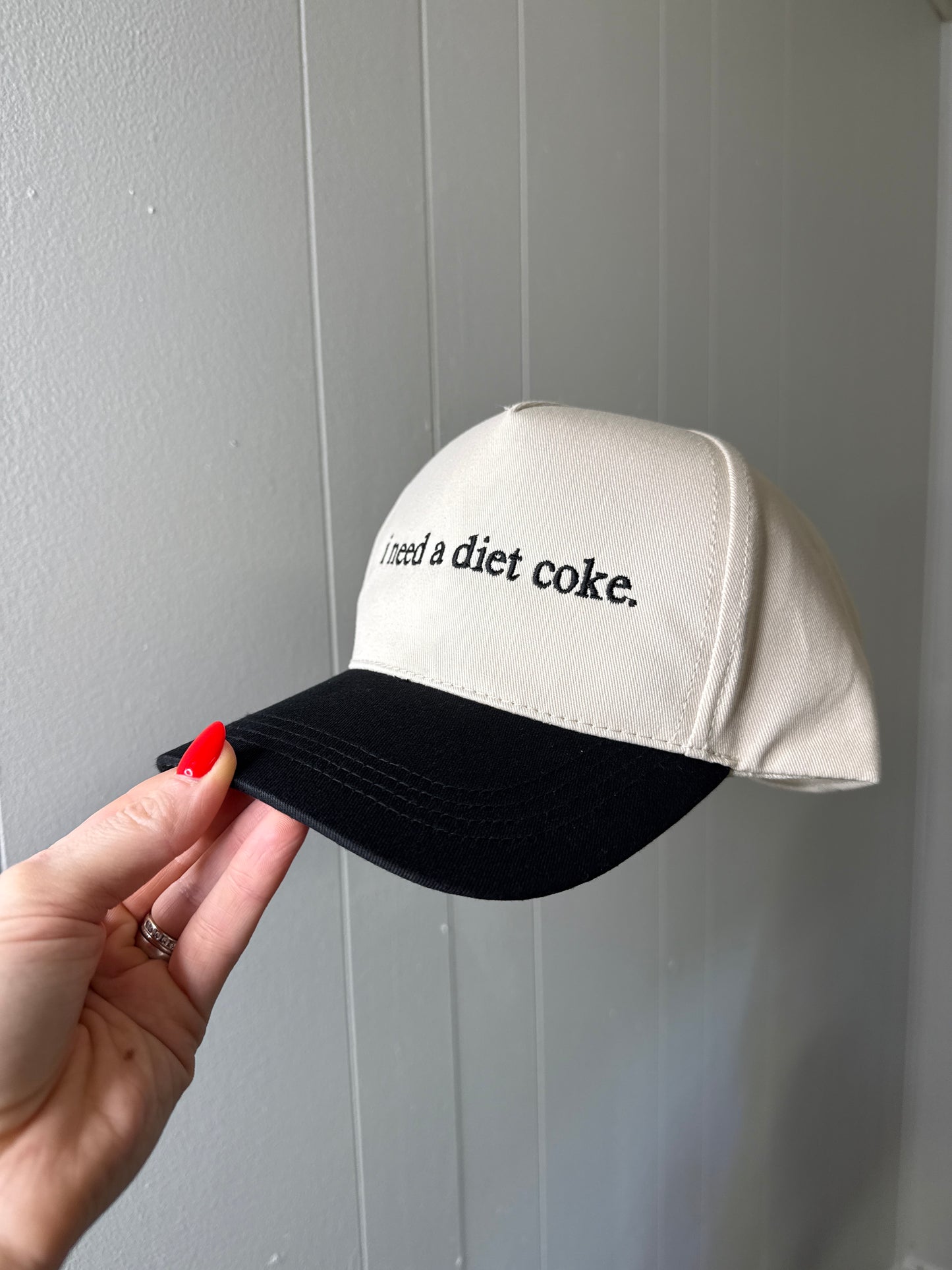 I need a Diet Coke black trucker hat