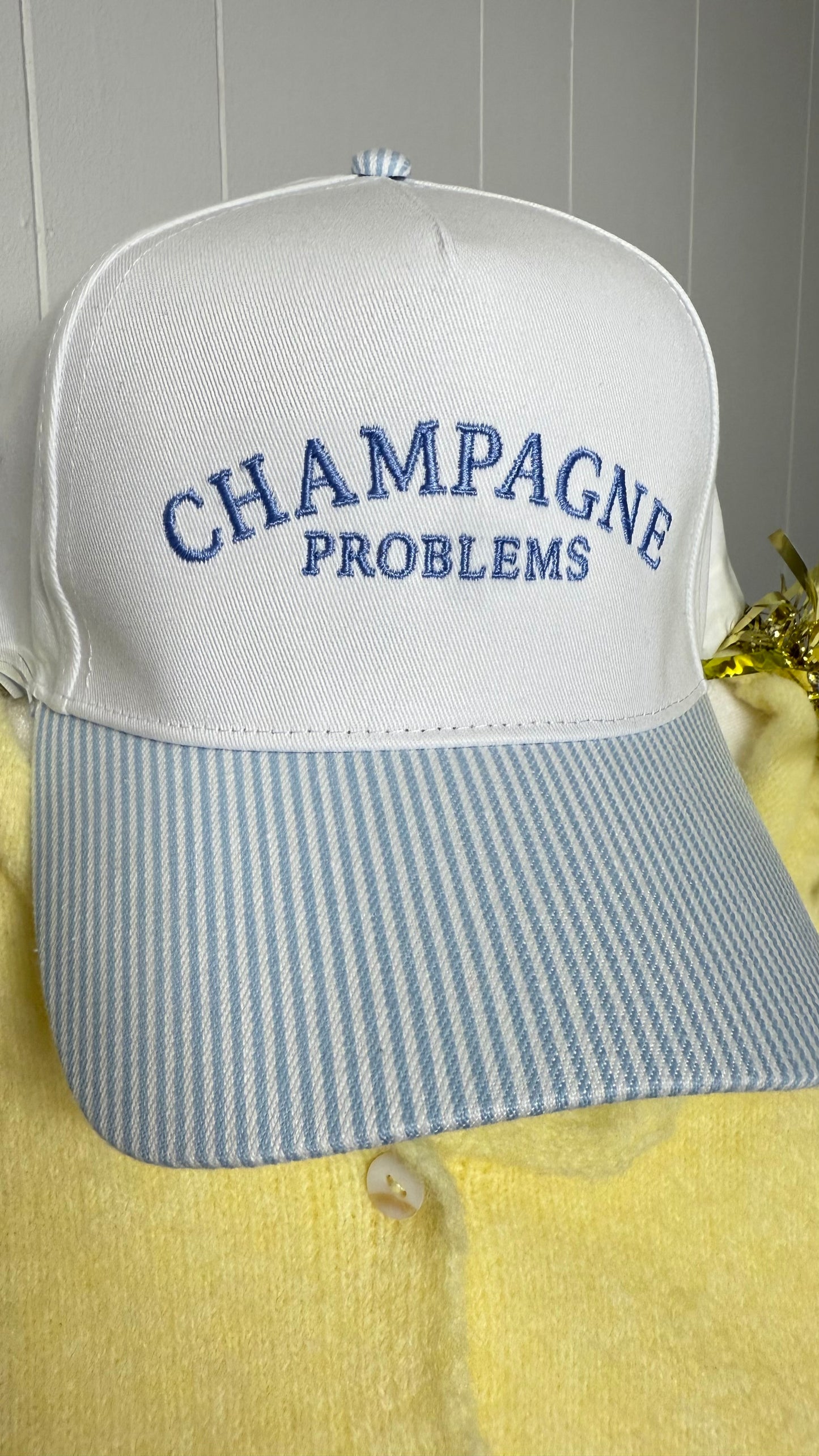CHAMPAGNE PROBLEMS Striped Trucker Hat