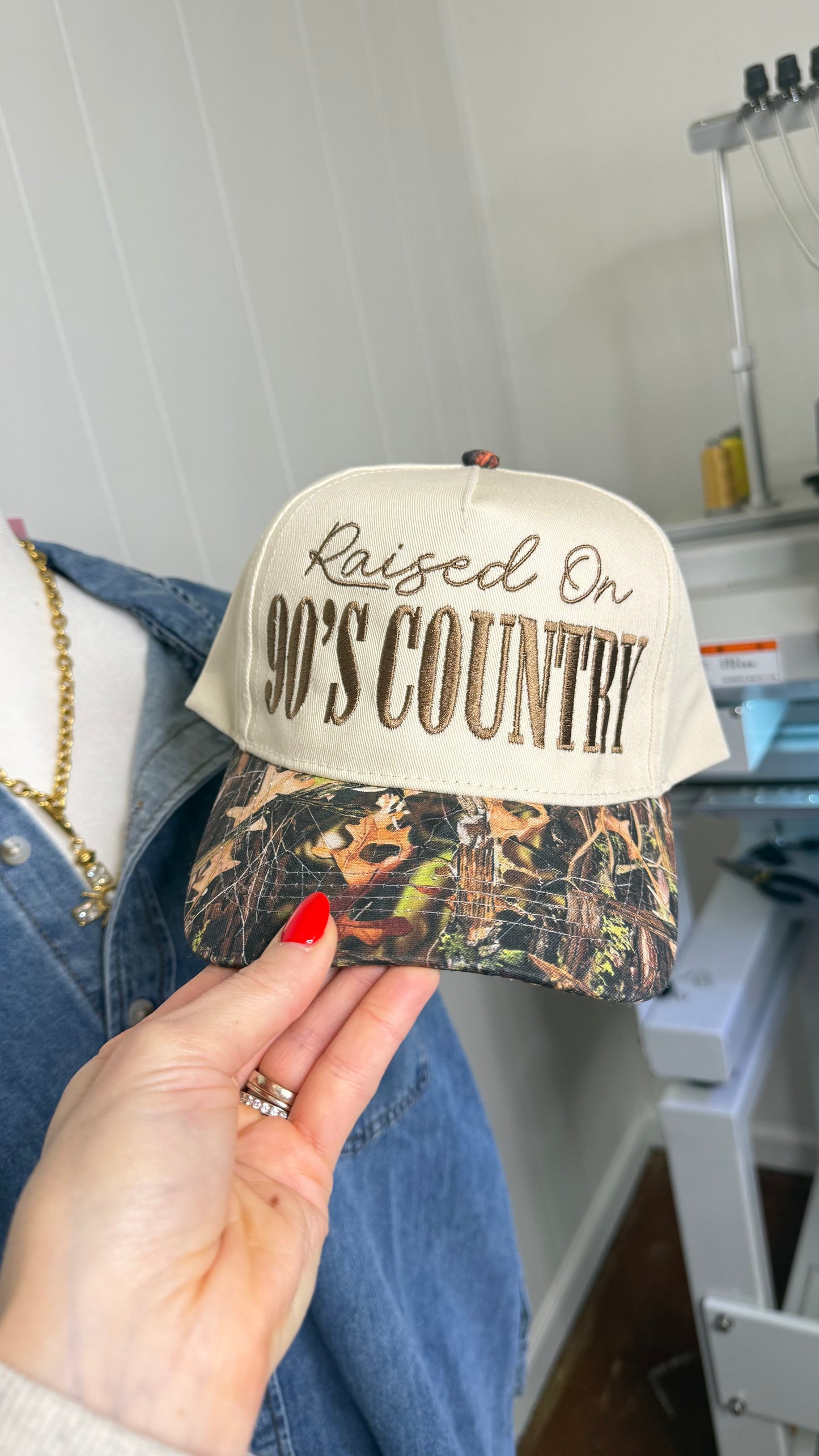 Raised On 90’s Country Camo Trucker Hat