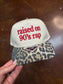 Raised on 90s rap cheetah brim trucker hat