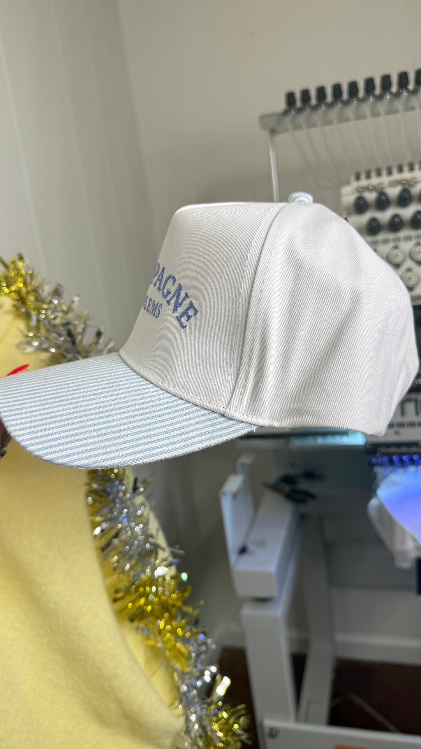 CHAMPAGNE PROBLEMS Striped Trucker Hat